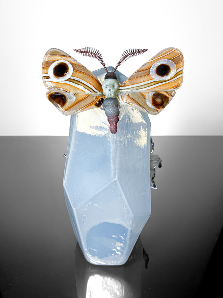 opalescent relic moth