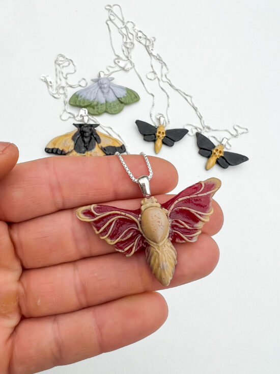 moth pendant necklace$75