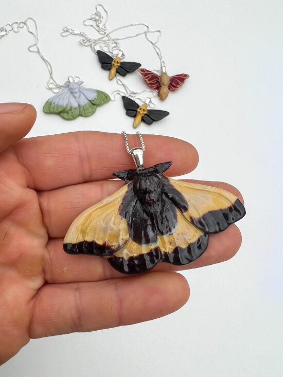 moth pendant necklace$75